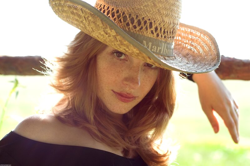Woman with Straw Hat — Brown, Serene