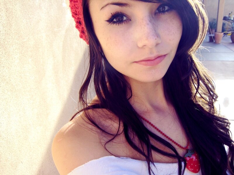 woman with strawberry necklace
