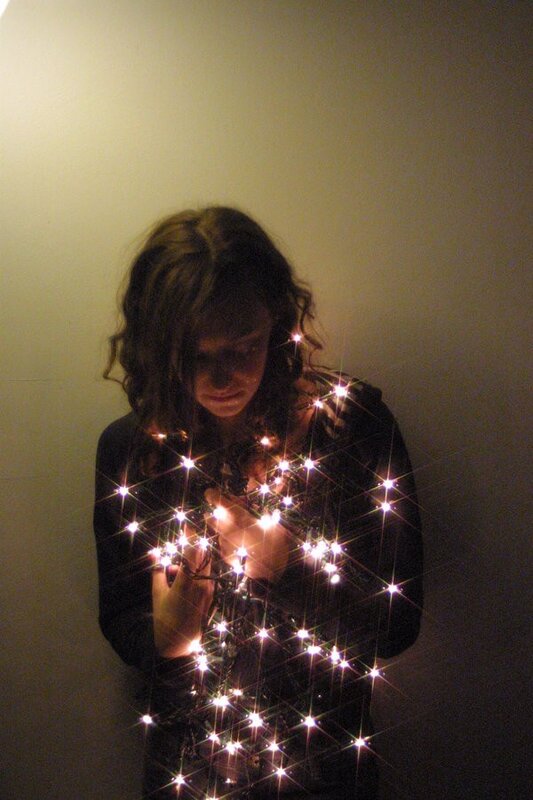 woman with string lights
