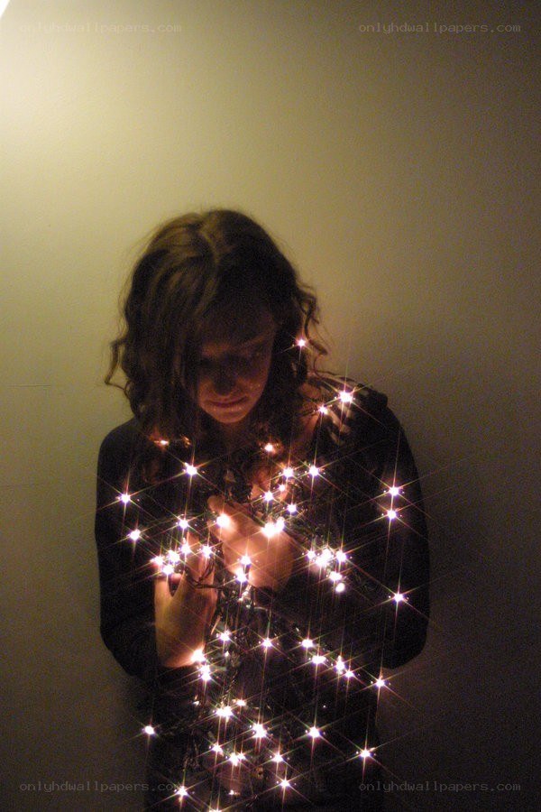 woman with string lights