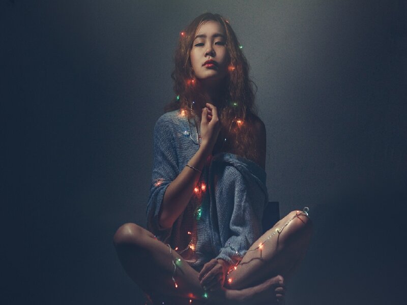 Woman with String Lights — Blue