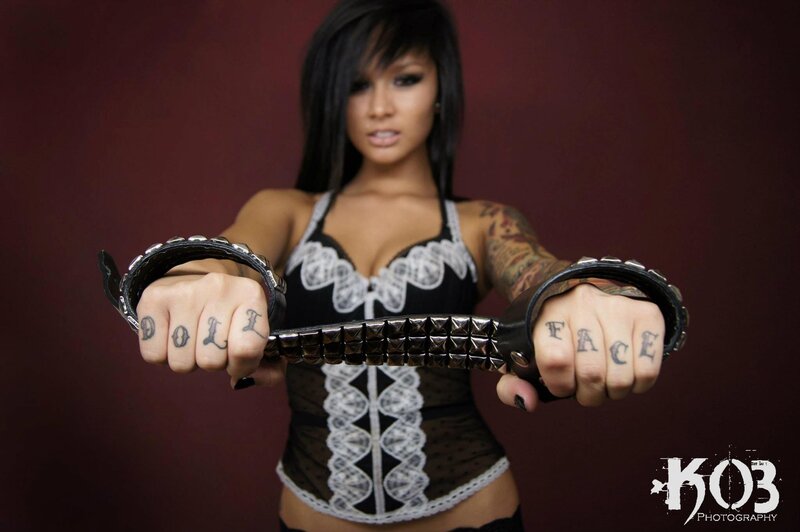 woman with studded gloves