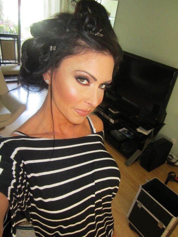 woman with styled hair and makeup
