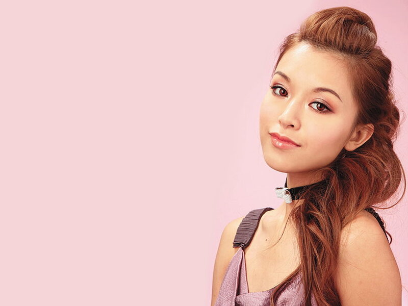 woman with styled hair and makeup