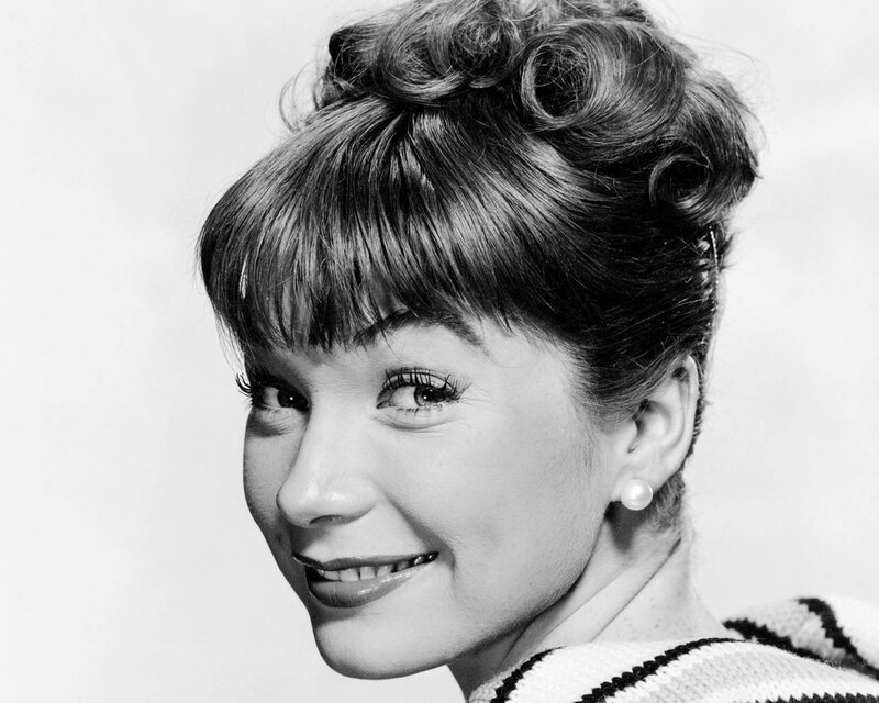 Woman with Styled Hair — Black, Smiling