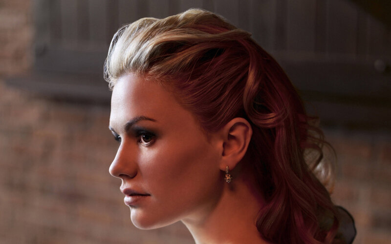 woman with styled hair in profile