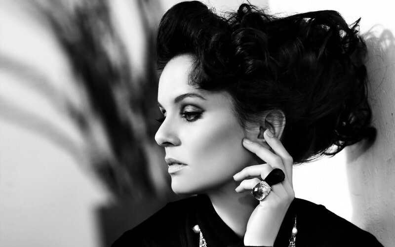 woman with styled hair in profile