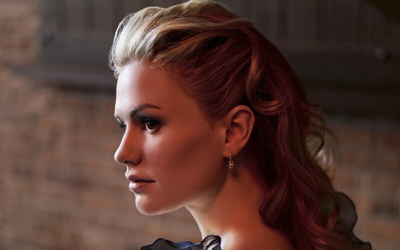 woman with styled hair in profile