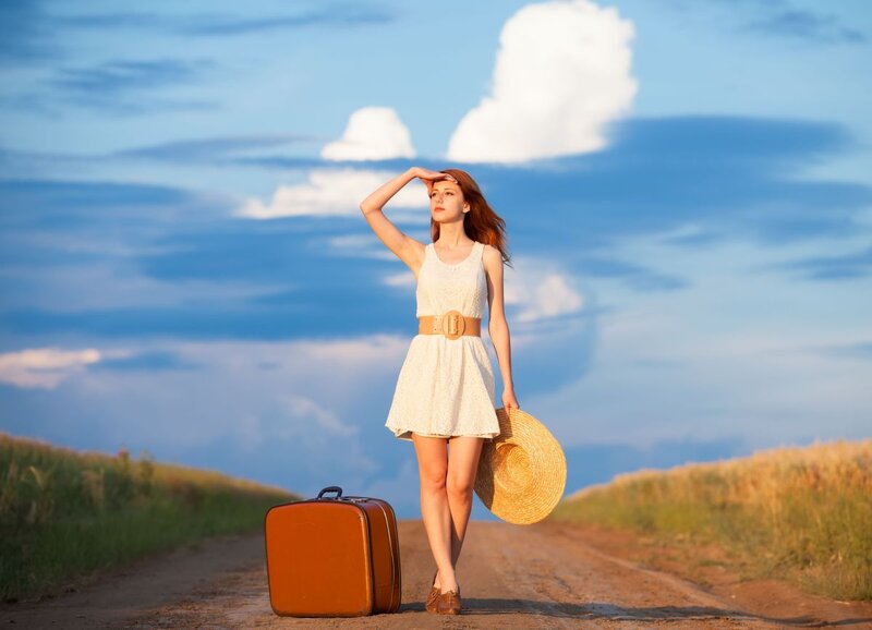 Woman with Suitcase — Blue, Serene, Sunset
