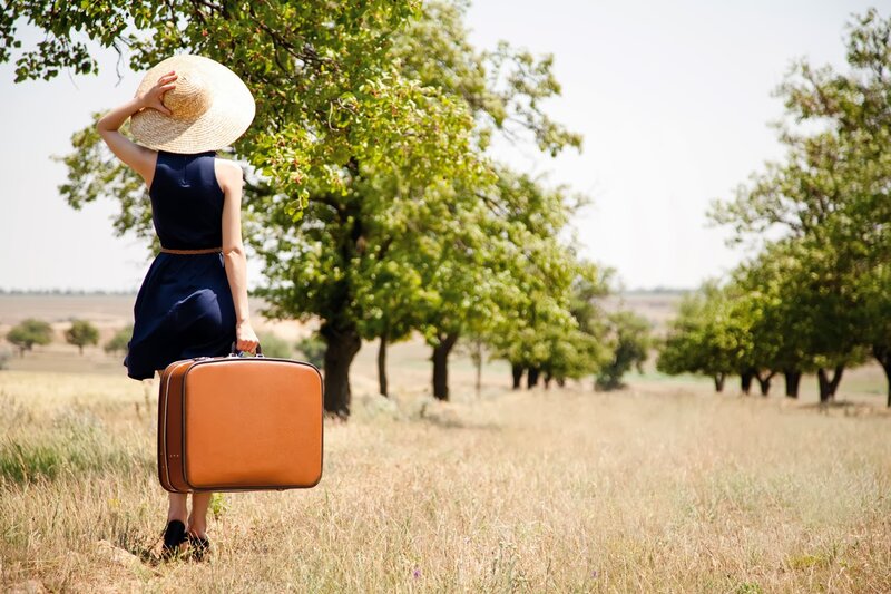 Woman with Suitcase — Blue, Serene