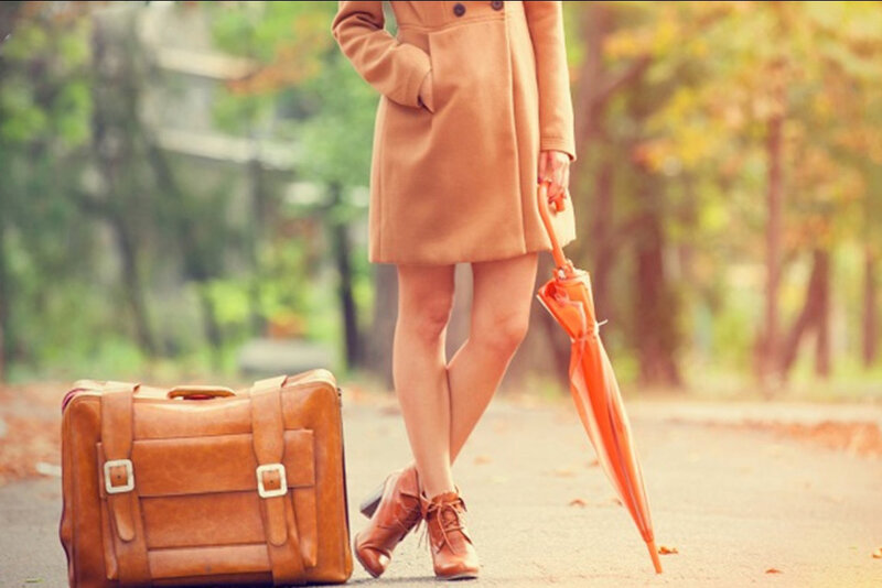Woman with Suitcase — Brown, Calm