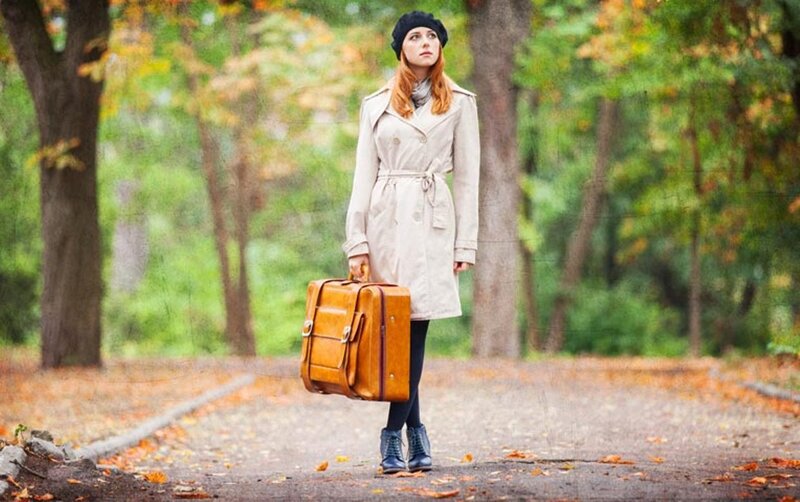 Woman with Suitcase — Brown, Contemplative, Autumn