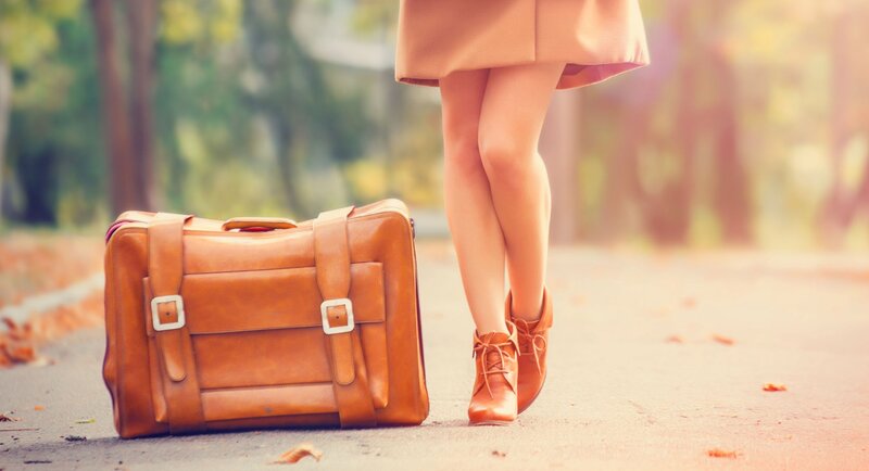 Woman with Suitcase — Brown, Serene, Autumn