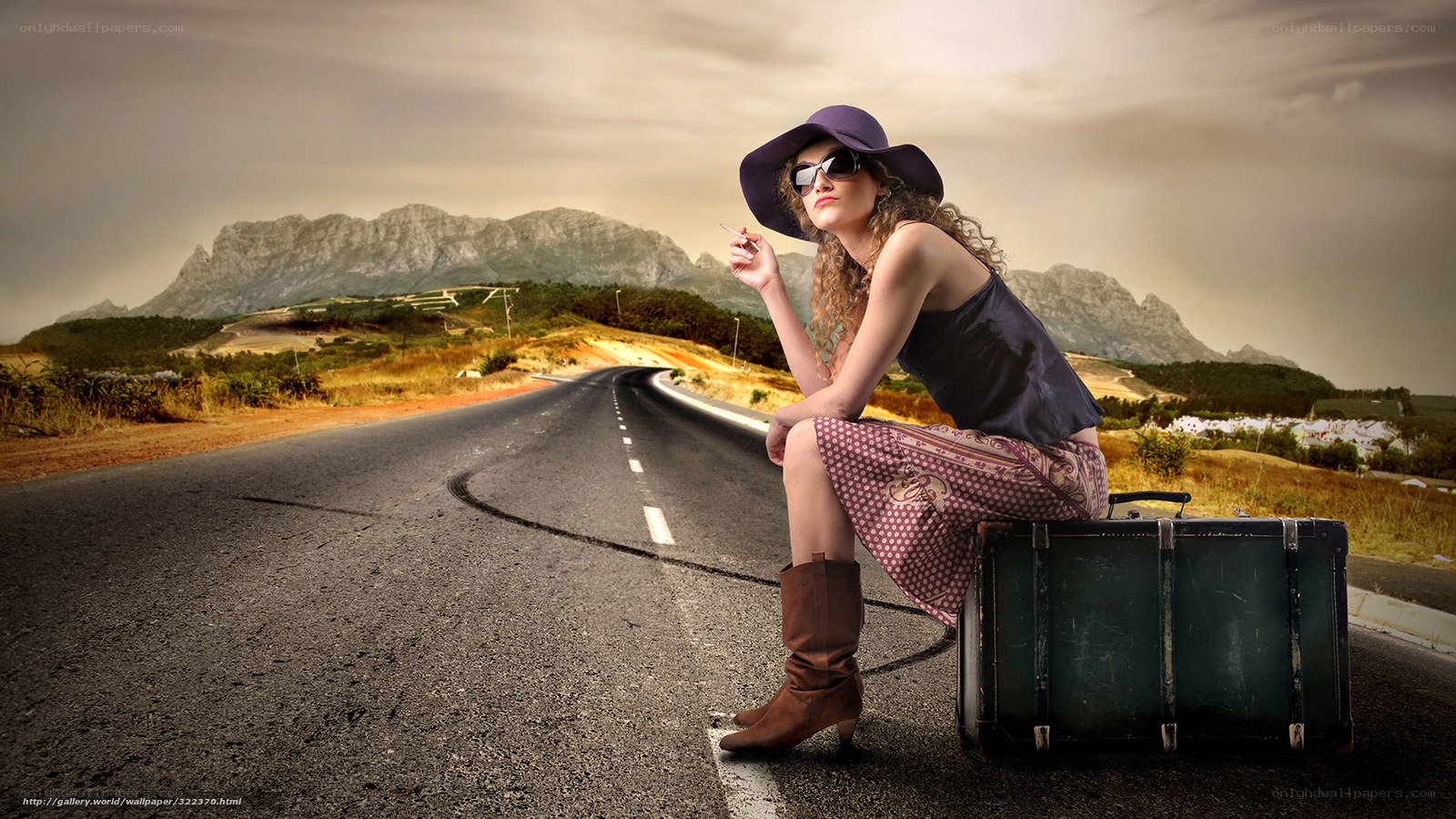 woman with suitcase on road