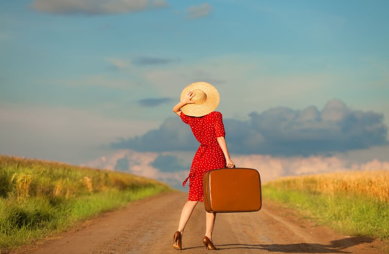 Woman with Suitcase — Red