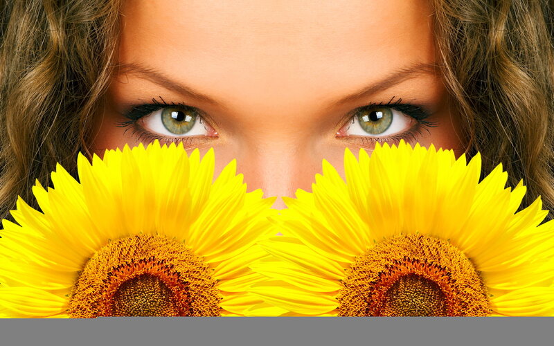 Woman with Sunflowers — Yellow, Playful, Photograph