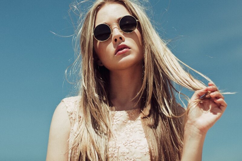 woman with sunglasses and blonde hair