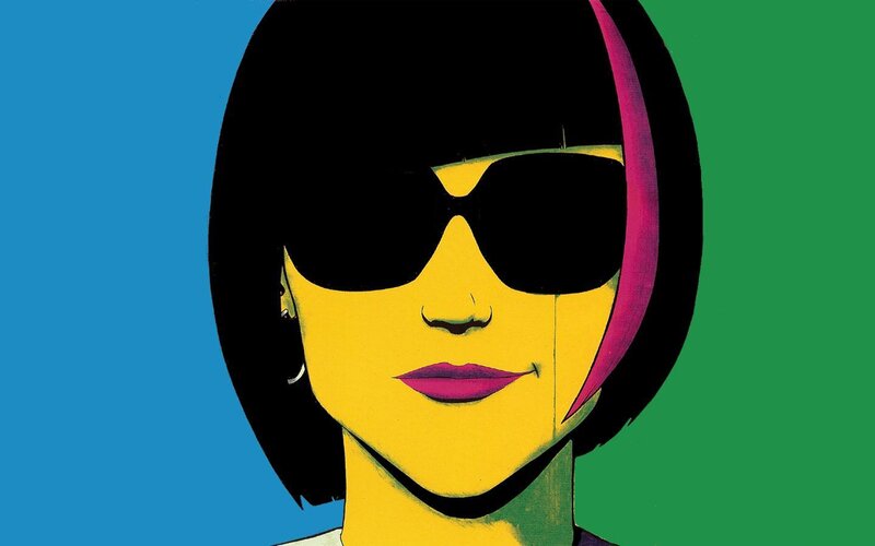 woman with sunglasses and colorful hair