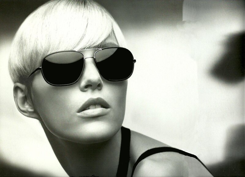 woman with sunglasses and short hair