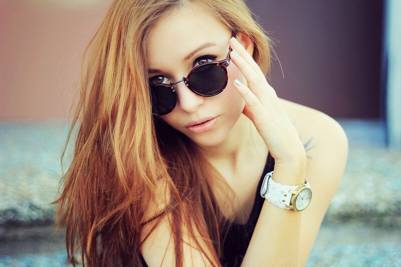 woman with sunglasses and watch