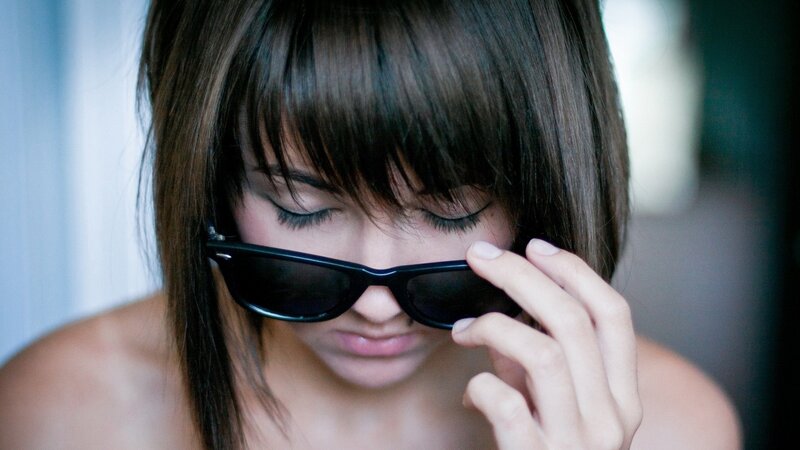 Woman with Sunglasses — Black, Contemplative