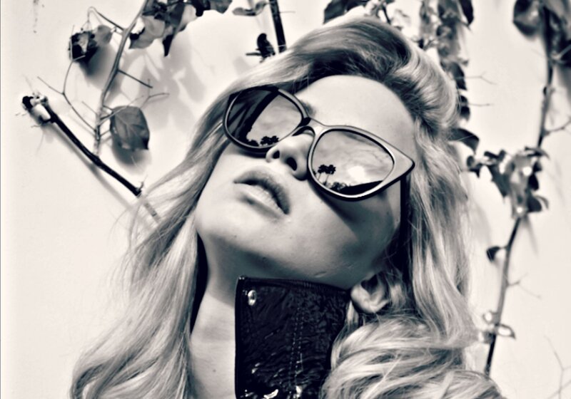 Woman with Sunglasses — Black, Dramatic, Photograph, Plants