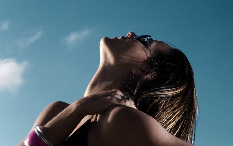 Woman with Sunglasses — Blue, Dramatic, Afternoon