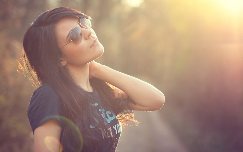 Woman with Sunglasses — Brown, Serene, Sunset