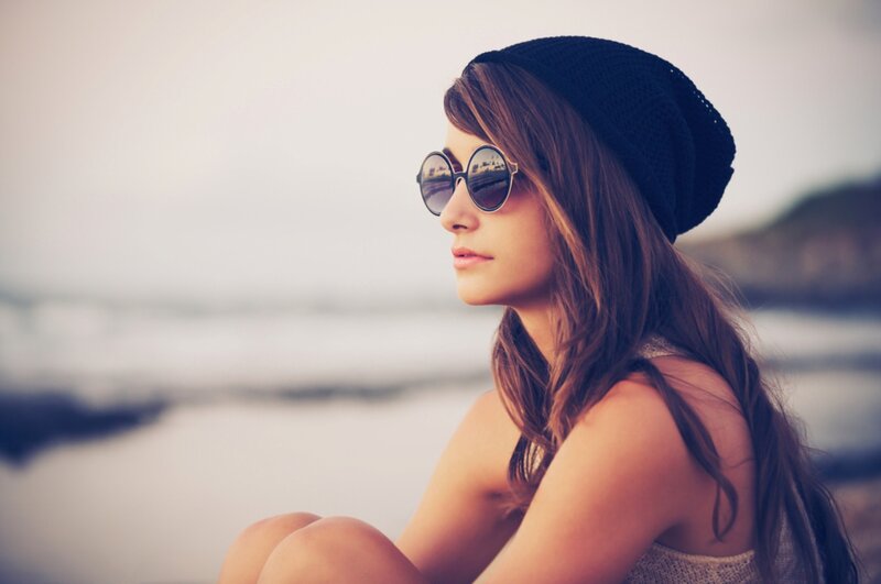 Woman with Sunglasses — Brown, Serene