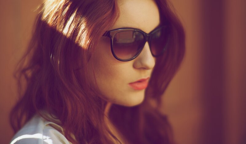 woman with sunglasses in sunlight