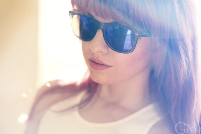 woman with sunglasses in sunlight