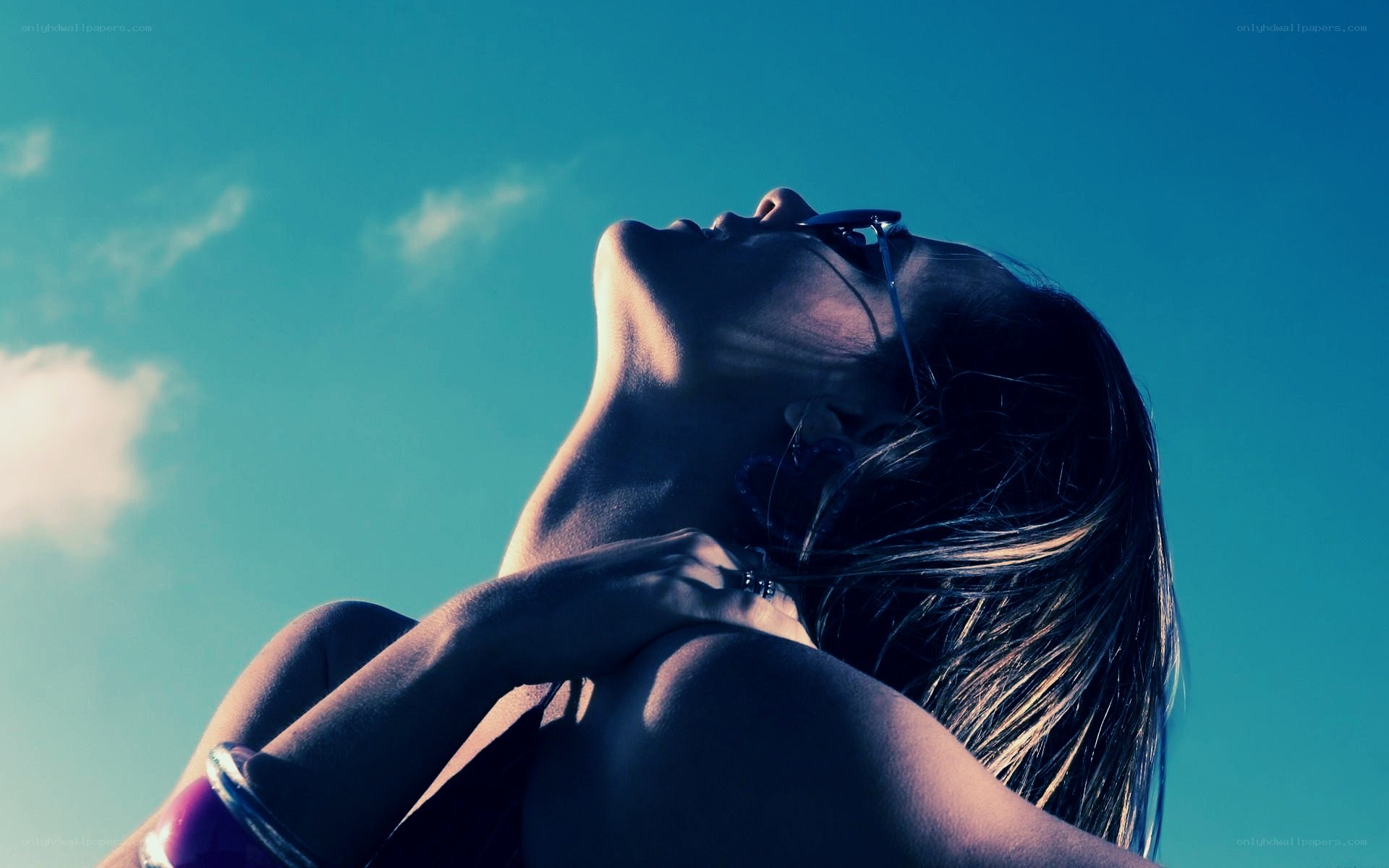 woman with sunglasses looking up
