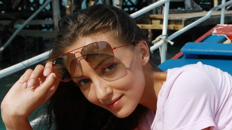 woman with sunglasses on boat