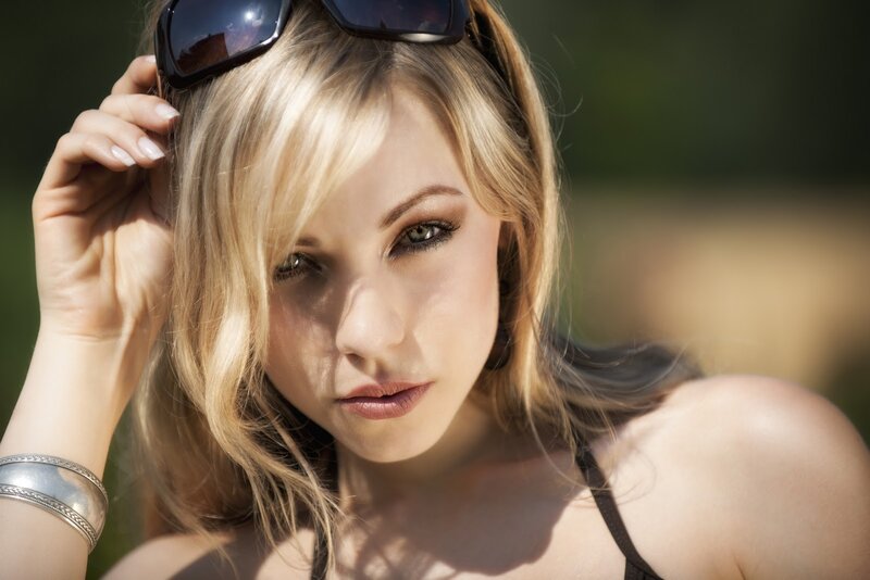 woman with sunglasses on head