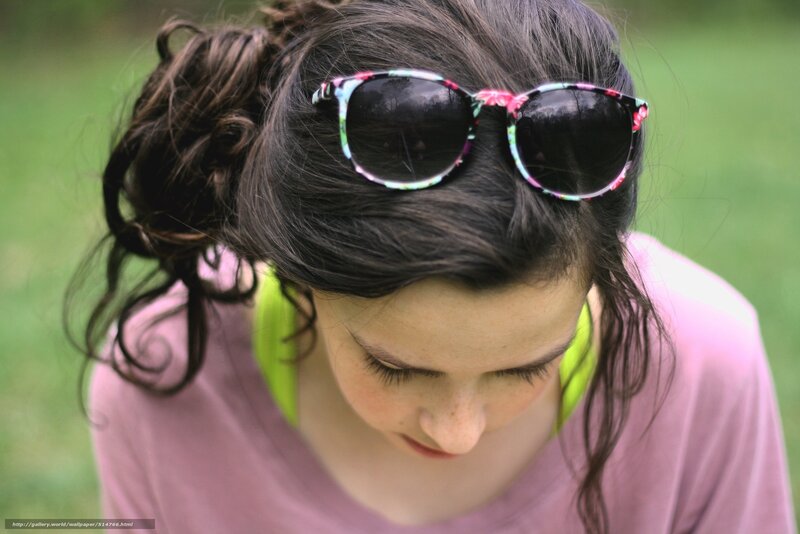 woman with sunglasses on head