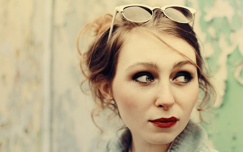 woman with sunglasses on head