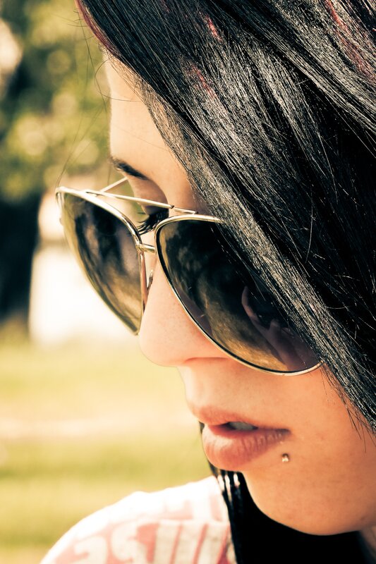 woman with sunglasses outdoors