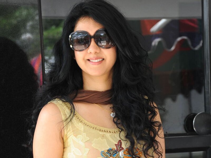 woman with sunglasses smiling