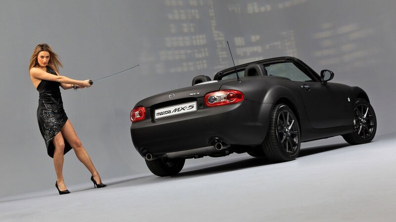 Woman with sword and Mazda MX-5