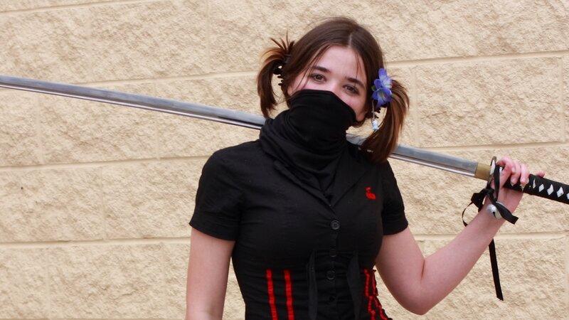 woman with sword in cosplay