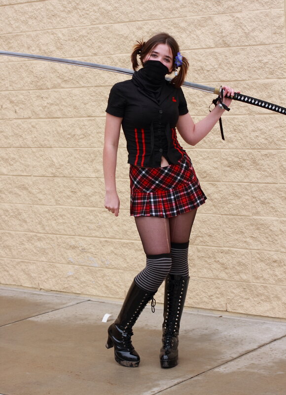 Woman with sword in cosplay