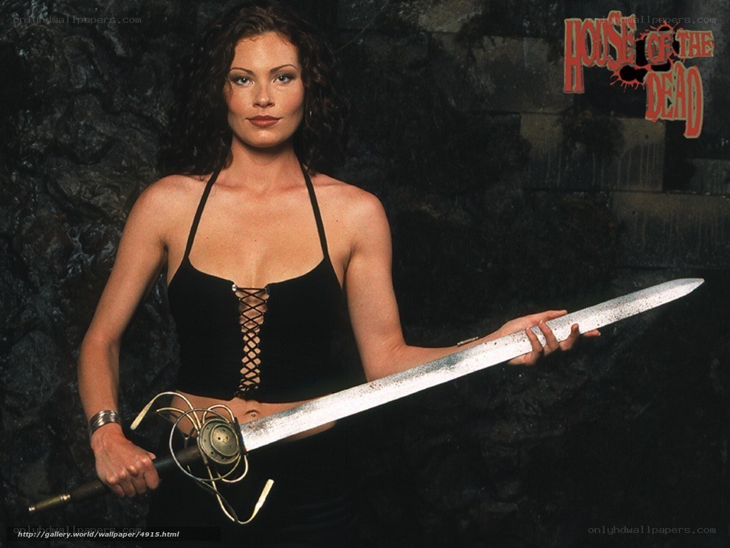 Woman with sword in dark setting