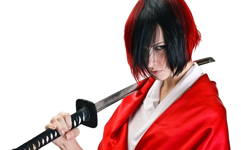 woman with sword in red kimono