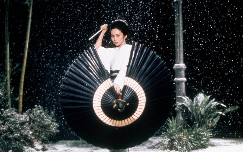 Woman with sword in snow