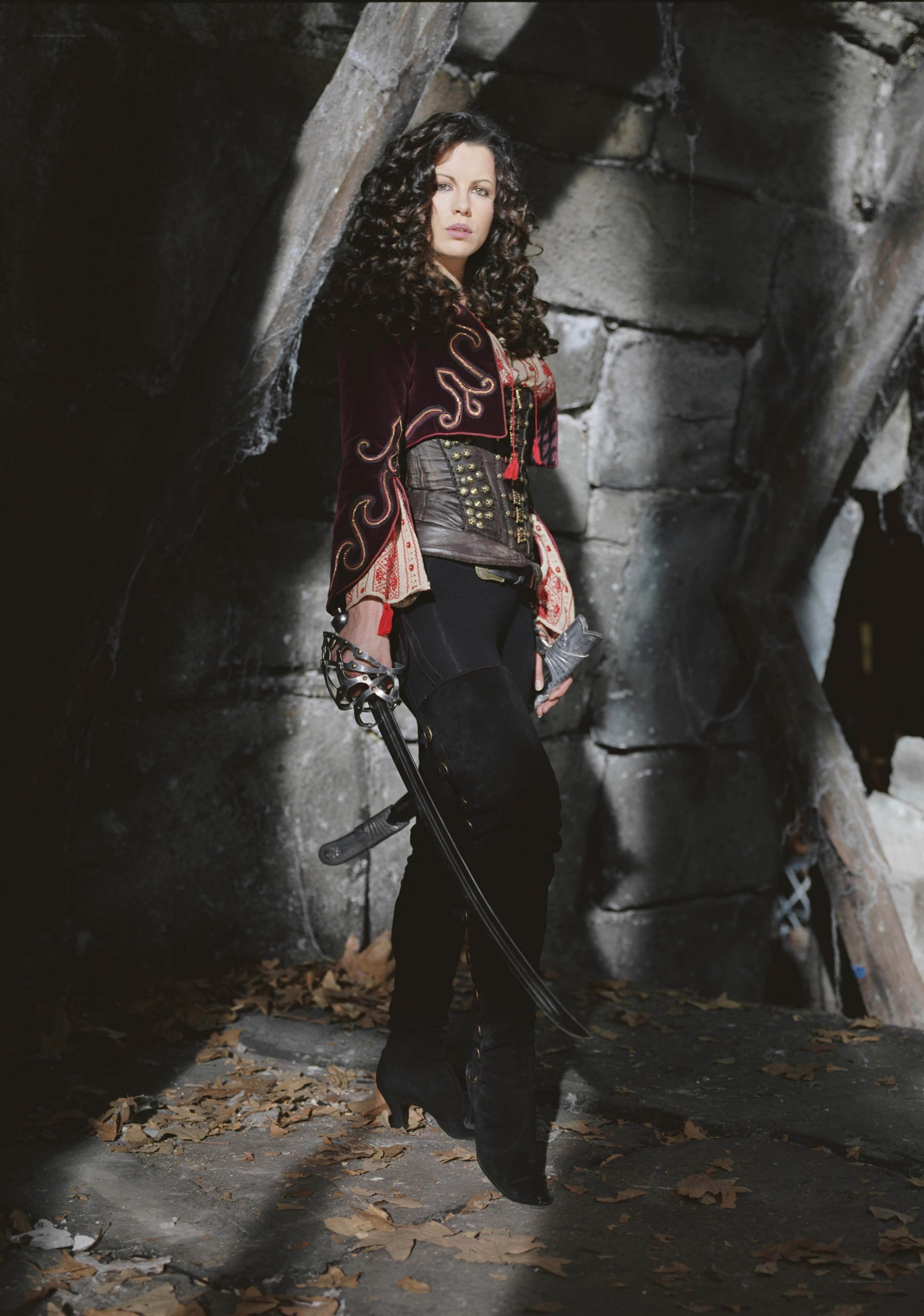 woman with sword in stone corridor