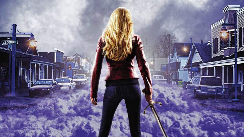 Woman with sword in town