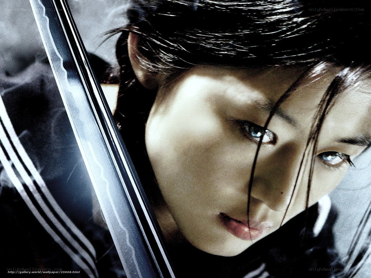 Woman with sword, intense gaze