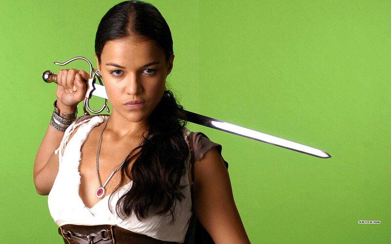 woman with sword on green screen