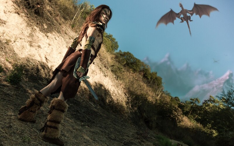 Woman with Sword on Hillside