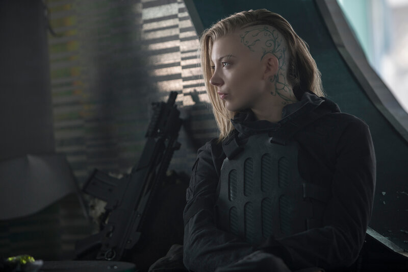 woman with tactical gear and rifle